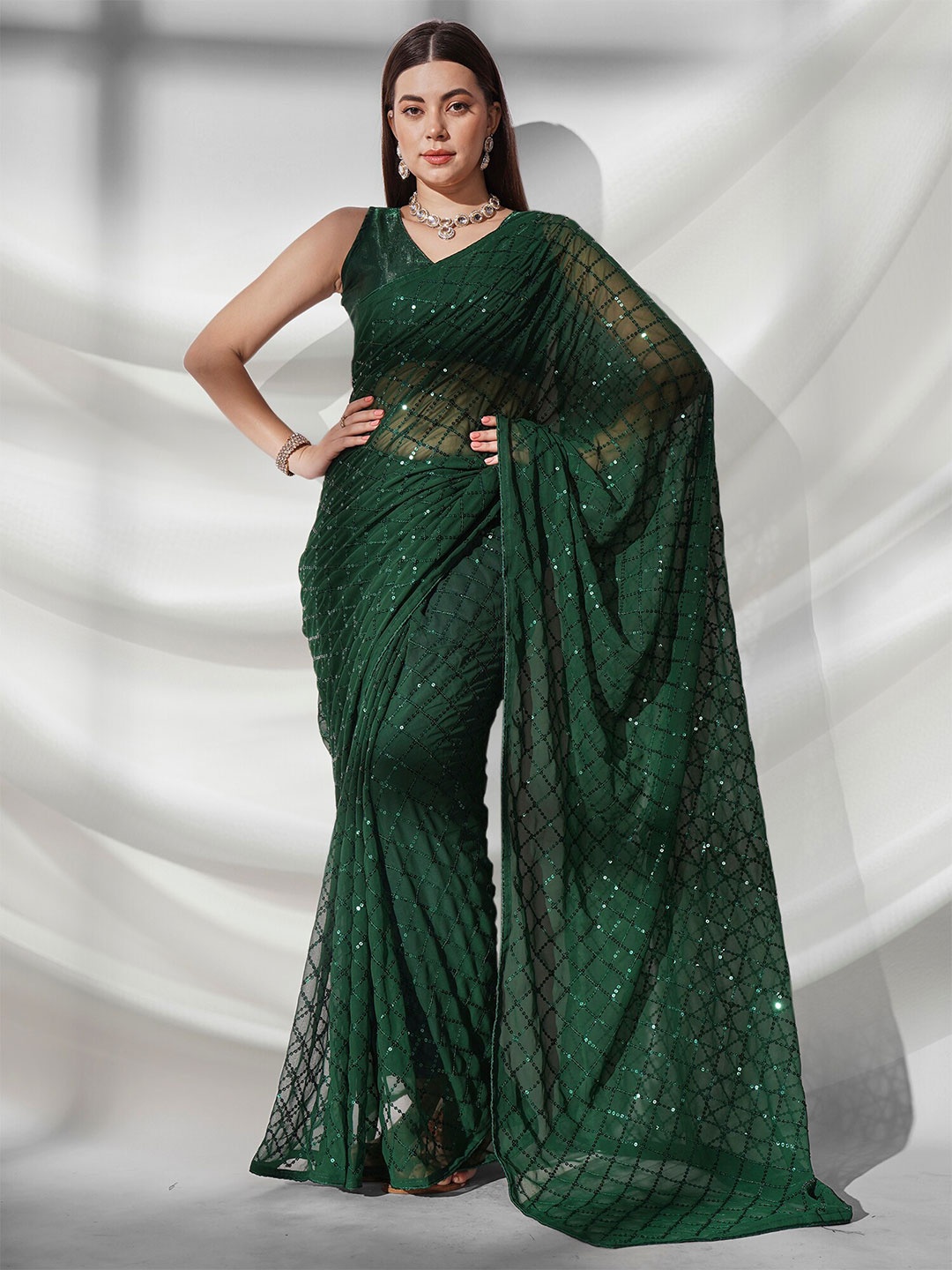 

Kalista Green Embellished Sequinned Pure Georgette Saree