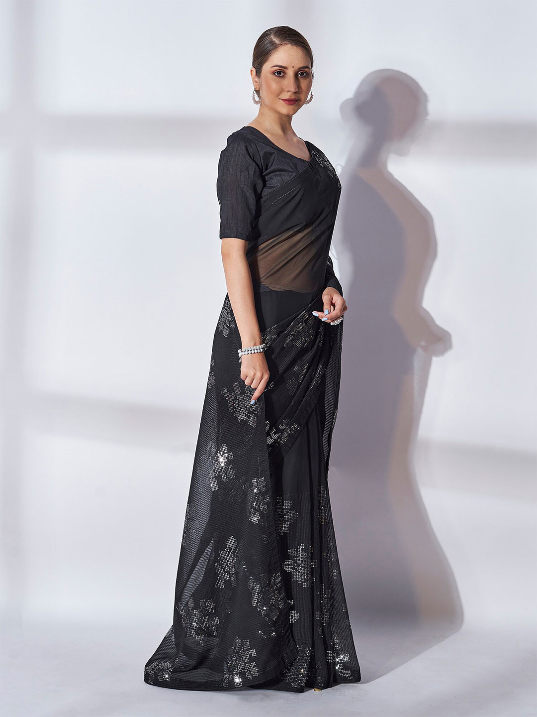 

Kalista Black & Silver-Toned Embellished Sequinned Pure Georgette Saree