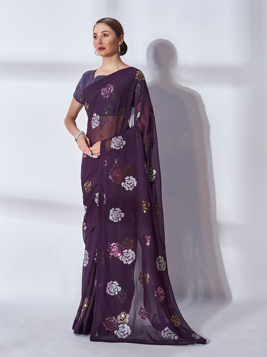 

Kalista Purple & Silver-Toned Embellished Sequinned Pure Georgette Saree