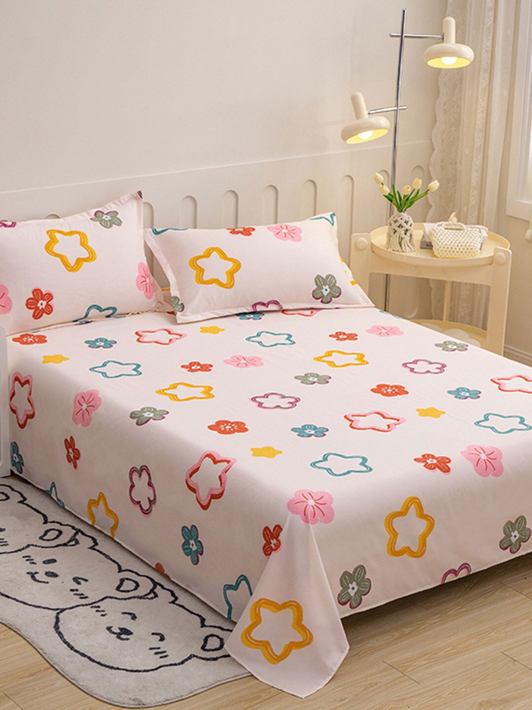 

JC Collection Pink & Red Star Printed 140 TC King Bedsheet with 2 Pillow Covers