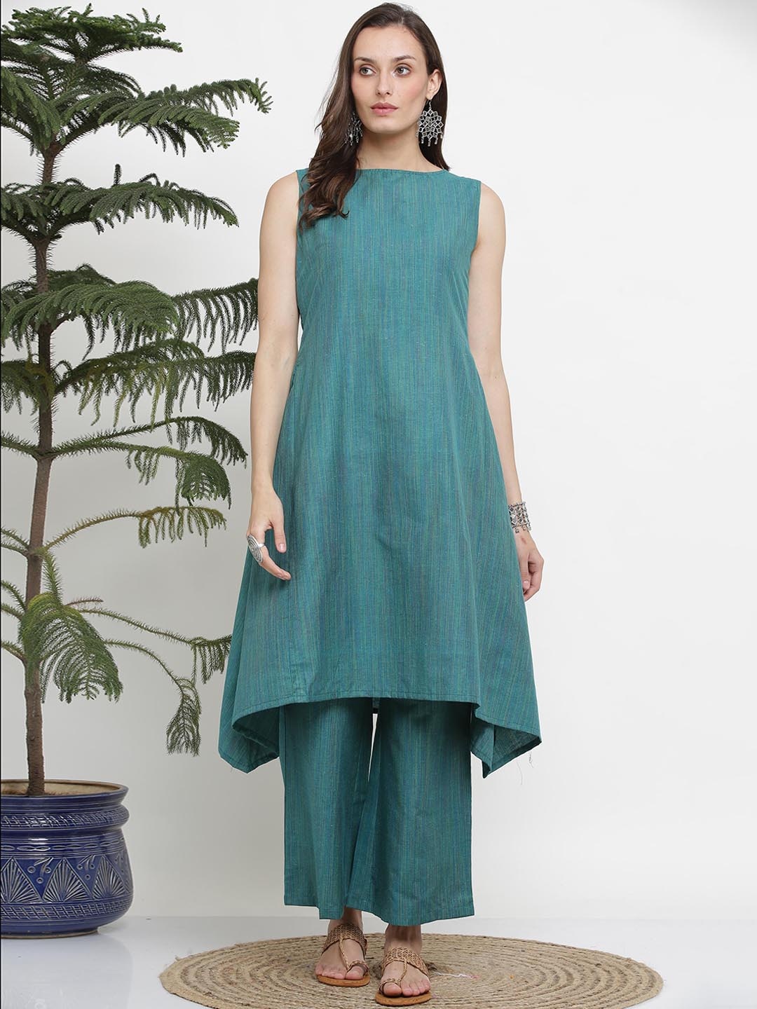 

KAANCHIE NANGGIA Asymmteric Sleeveless A-Line Kurta with Palazzos, Teal