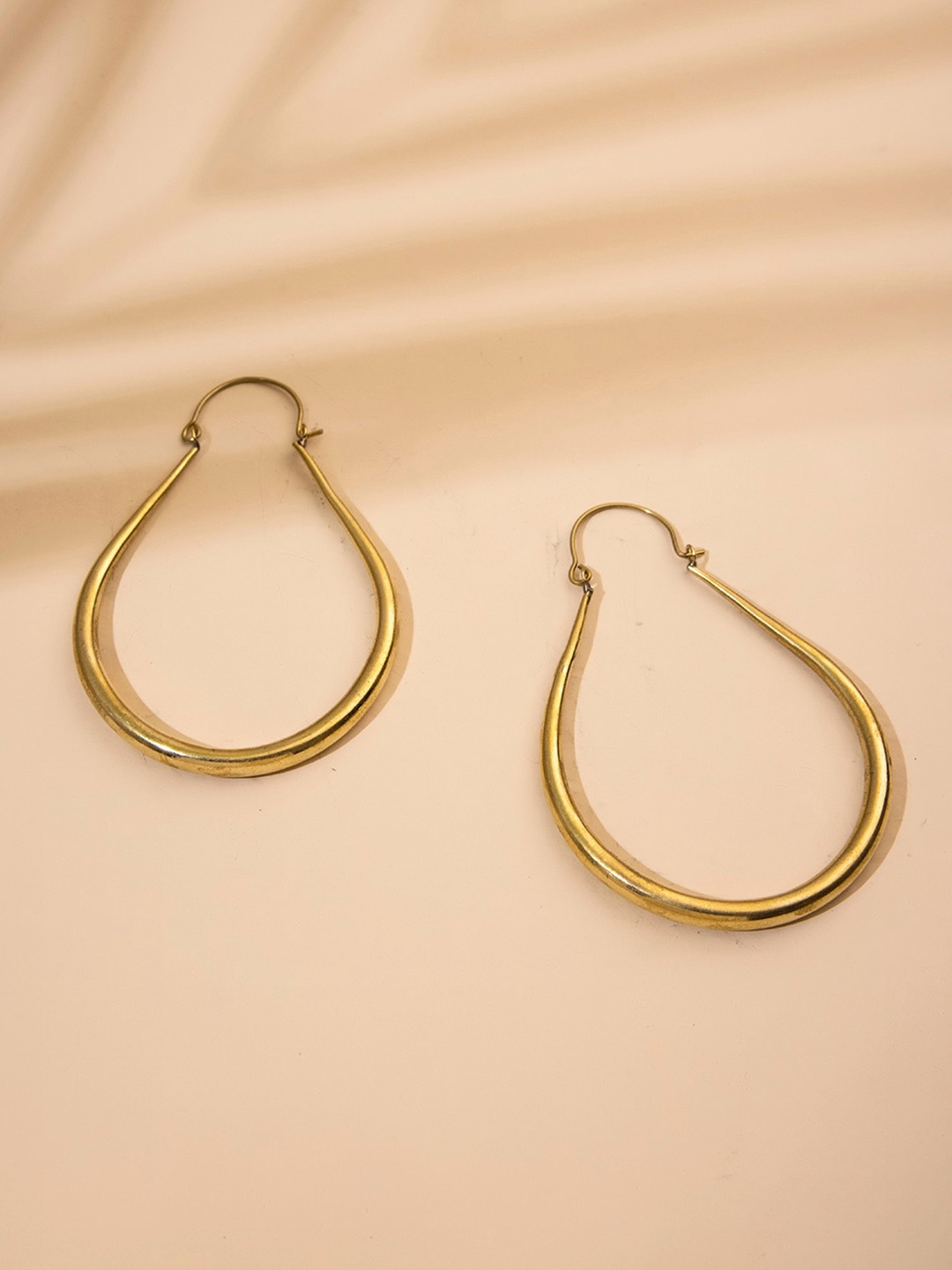 

Studio One Love Brass-Plated Contemporary Hoop Earrings, Gold