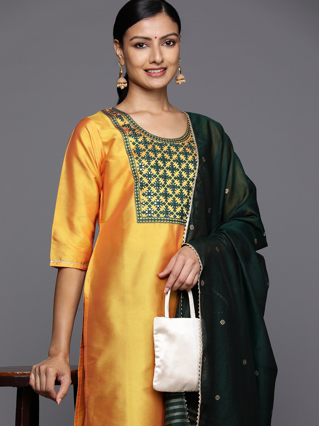 

Libas Ethnic Motifs Yoke Design Mirror Work Kurta With Trousers & Dupatta, Yellow