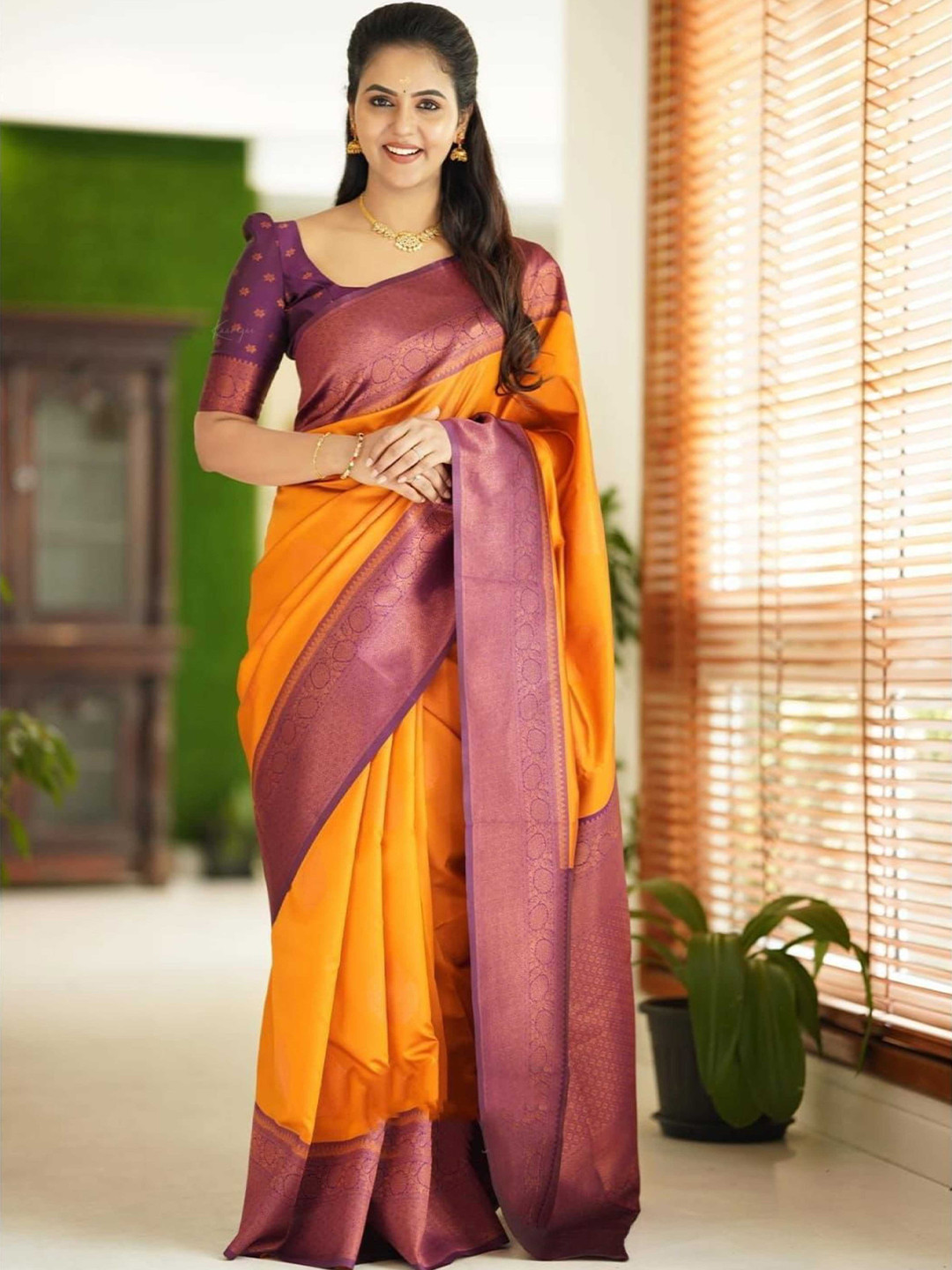 

Mitera Yellow & Purple Woven Design Zari Saree