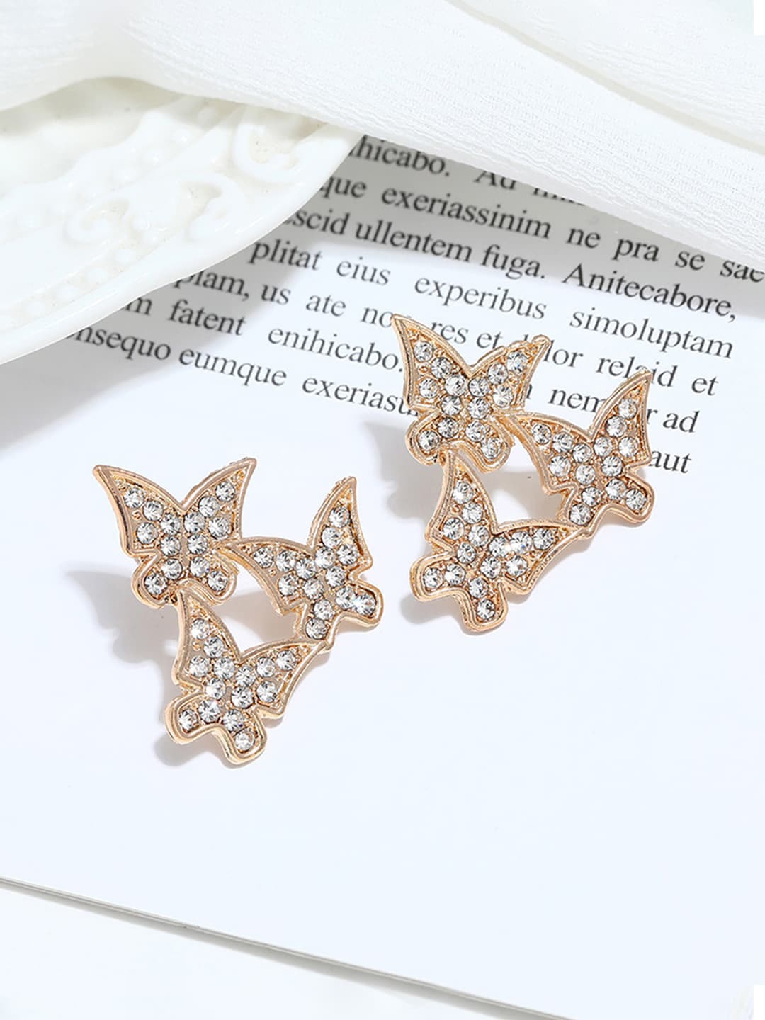 

Jewels Galaxy Gold-Plated Artificial Stoned Studs Earrings