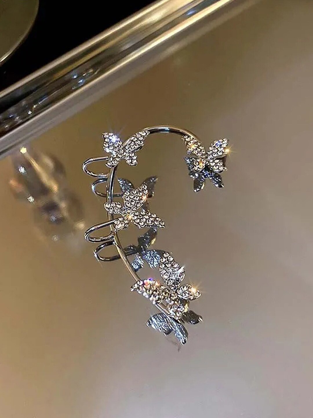 

Jewels Galaxy Silver-Plated Contemporary Ear Cuff Earrings