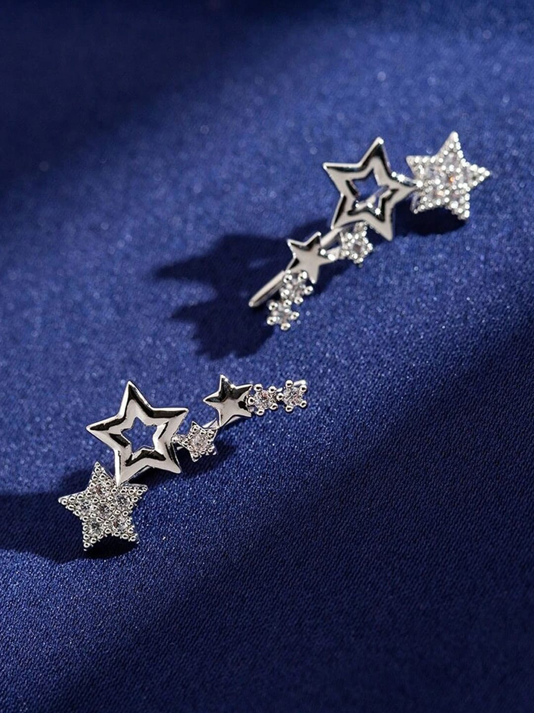

Jewels Galaxy Silver-Plated Star Shaped Studs Earrings