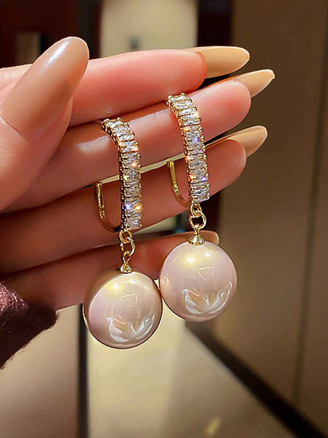 

Jewels Galaxy Gold-Plated American Diamonds Contemporary Drop Earrings