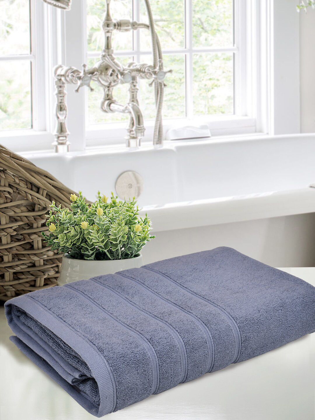 

Home Fresh Luxuria Blue Self Design 450 GSM Pure Cotton Bath Towel