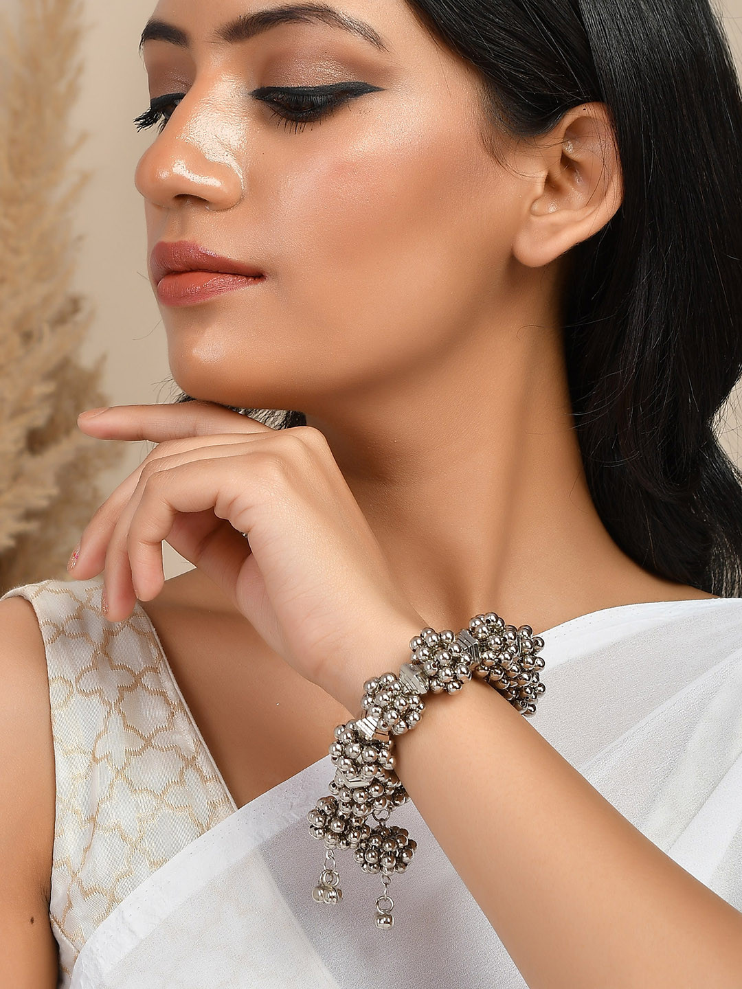 

Infuzze Women Silver-Plated Ghungroo Oxidised Wrap Around Bracelet