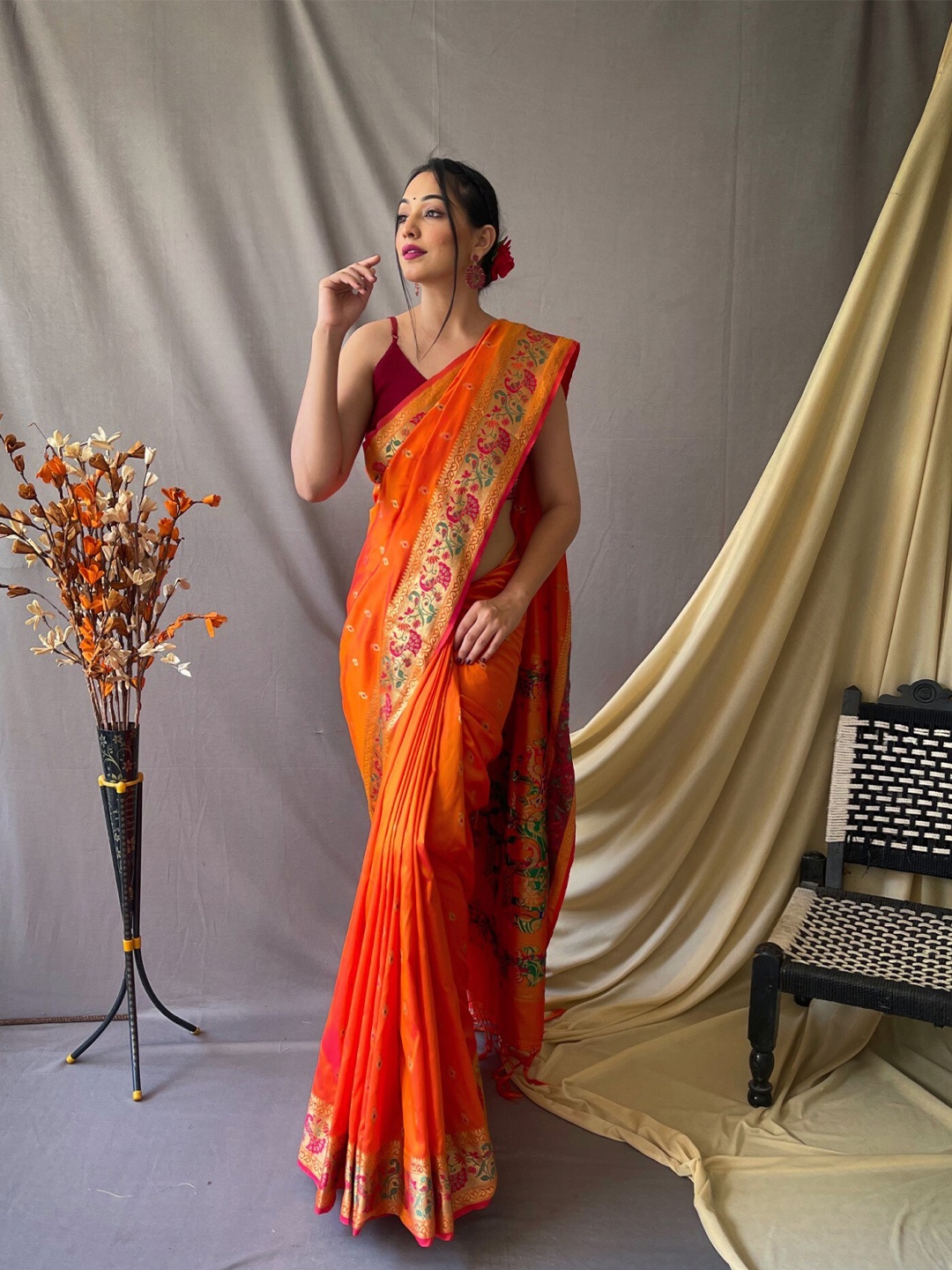 

Mitera Orange & Green Ethnic Motif Woven Design Zari Paithani Saree