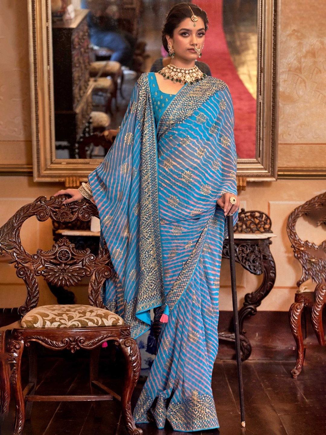 

Mitera Blue & Gold-Toned Leheriya Printed Embroidered Pure Georgette Saree