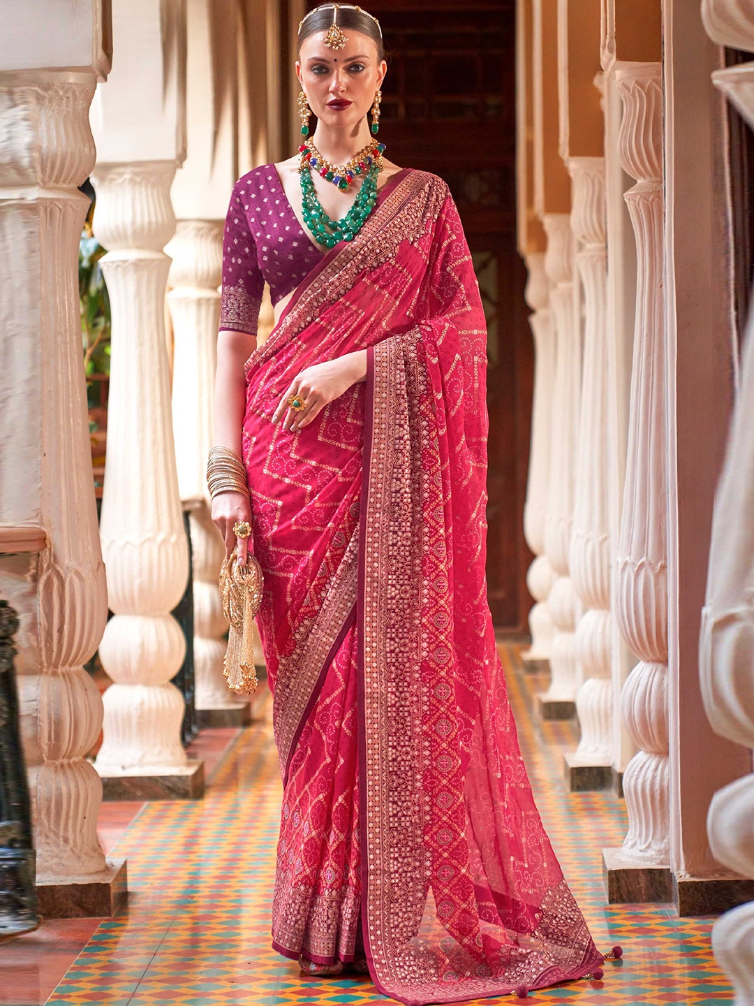 

Mitera Pink & Gold-Toned Ethnic Motifs Printed Embroidered Pure Georgette Saree