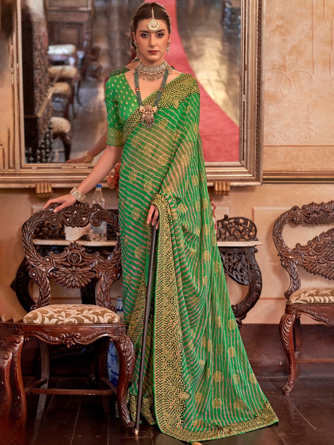 

Mitera Green & Pink Leheriya Printed Pure Georgette Saree