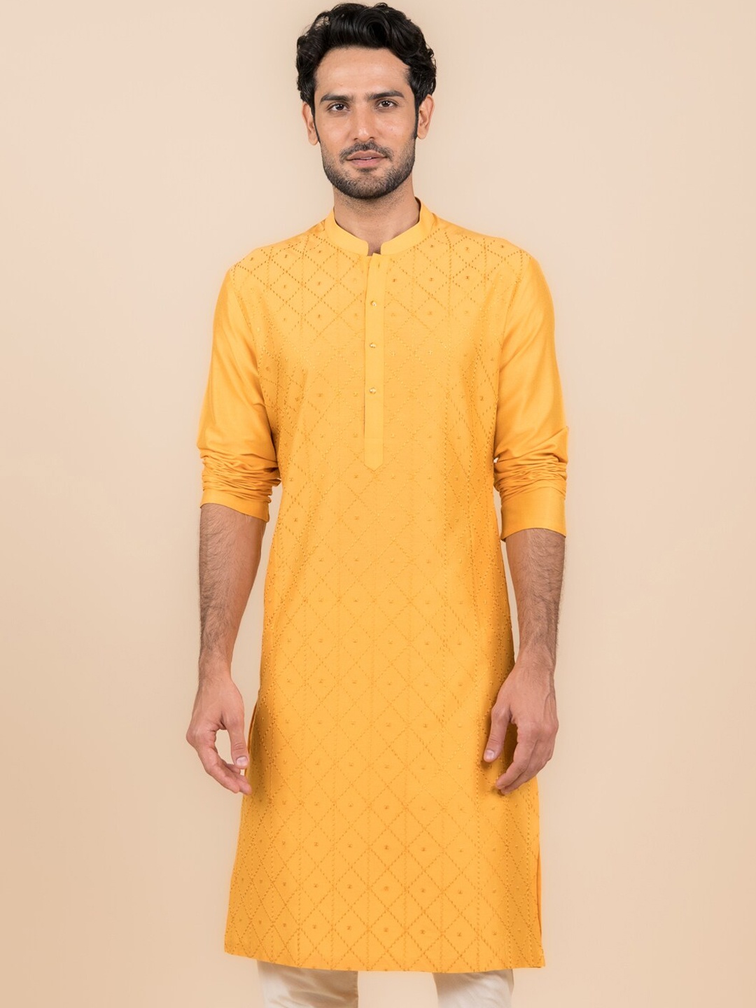 

Tasva Ethnic Motifs Embroidered Mandarin Collar Kurta with Churidar, Mustard