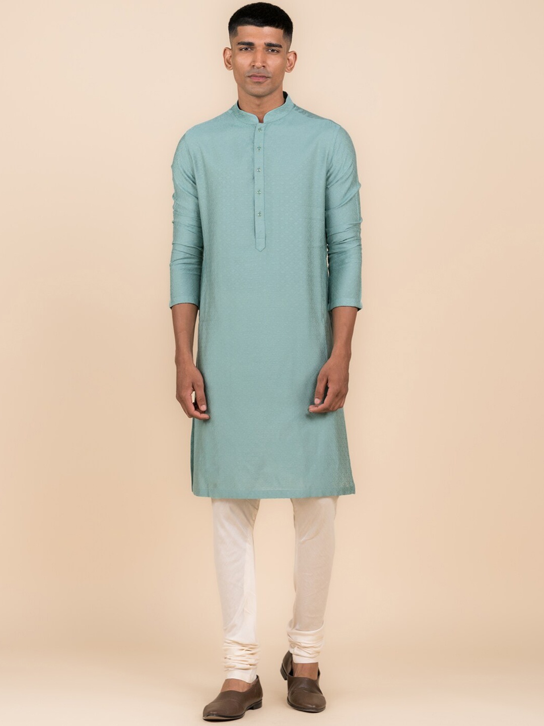 

Tasva Manadrin Collar Ethnic Motifs Self Design Kurta with Churidar, Blue