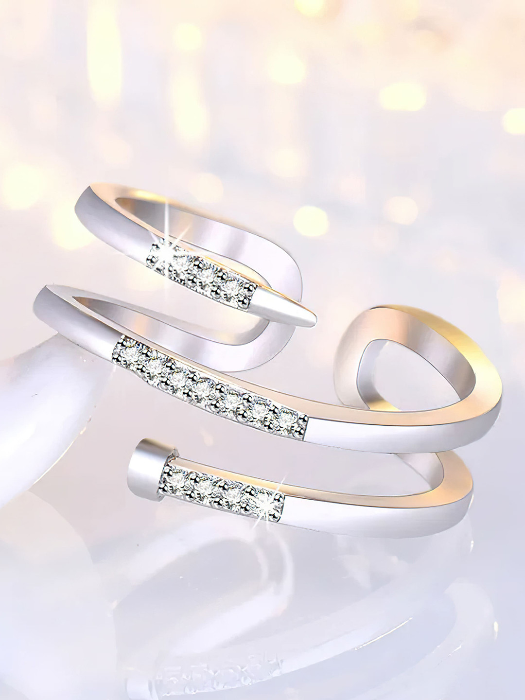 

Fashion Frill Silver Plated American Diamond Studded Adjustable Finger Ring