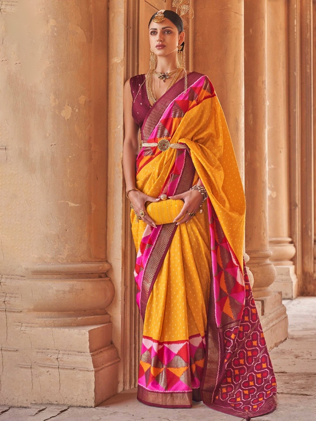 

Mitera Yellow & Pink Ethnic Motif Zari Silk Blend Patola Saree With Blouse Piece