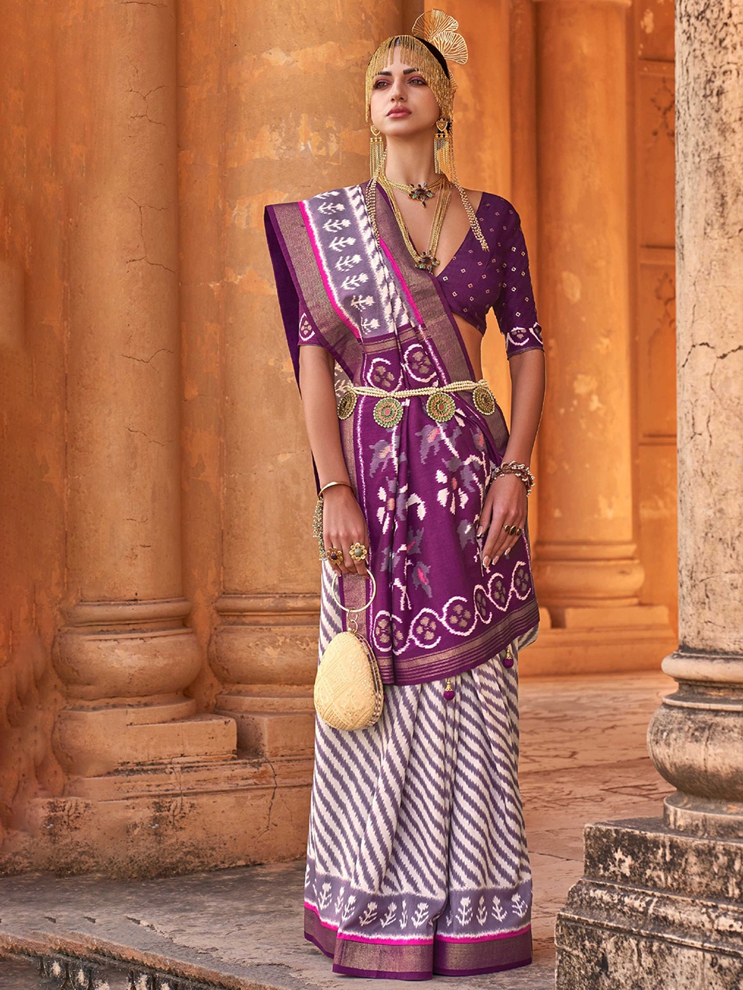 

Mitera Purple & White Leheriya Printed Zari Patola Silk Saree