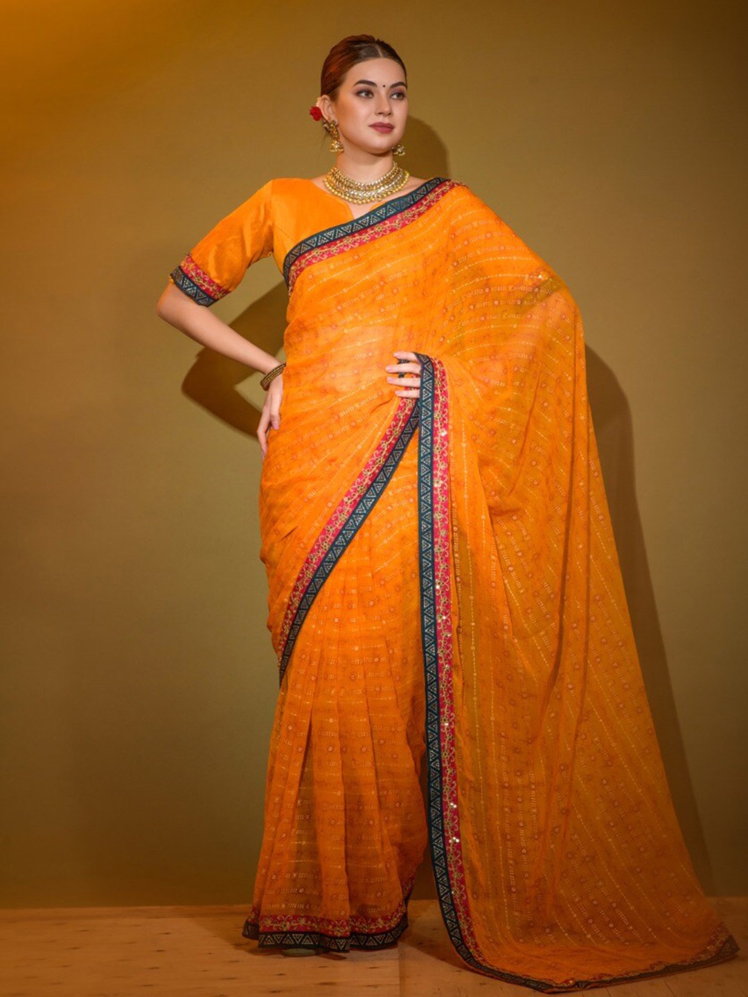 

VEERAX Ethnic Motifs Printed Saree, Orange