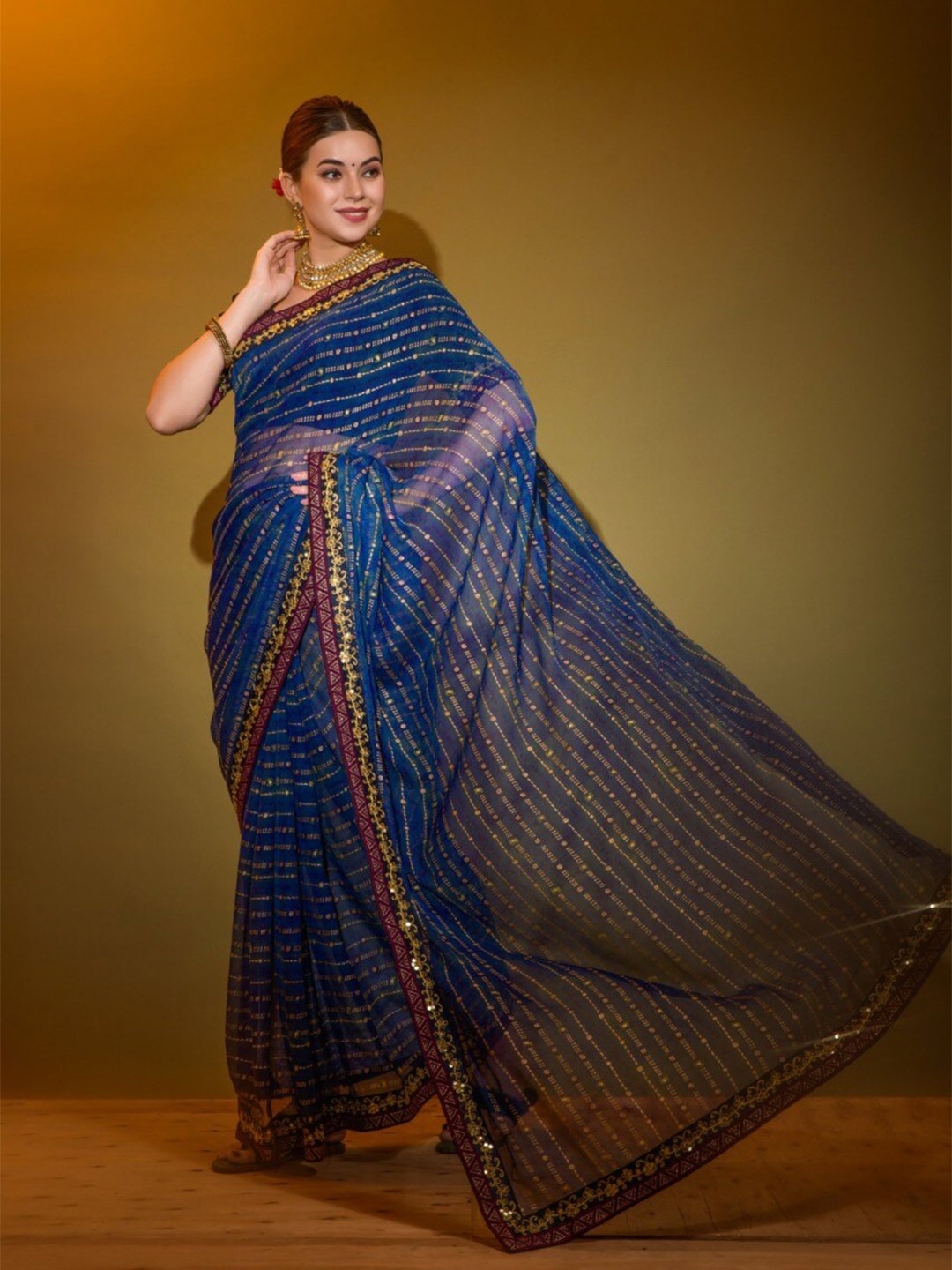 

VEERAX Ethnic Motifs Embroidered Saree, Blue