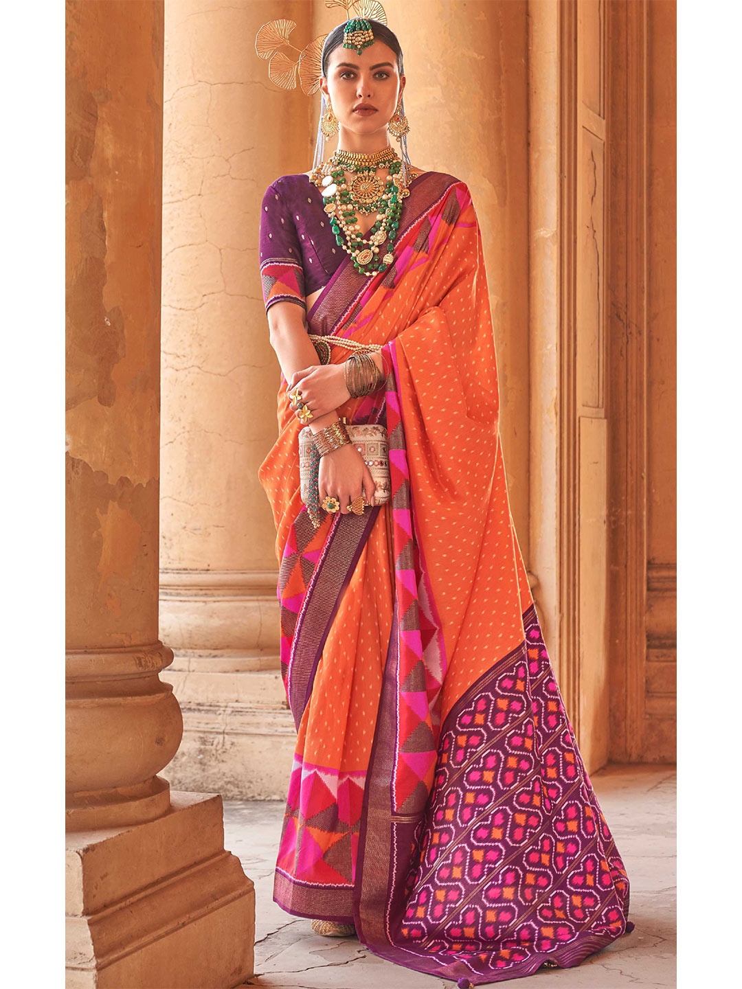 

Mitera Orange & Purple Ethnic Motifs Patola Saree