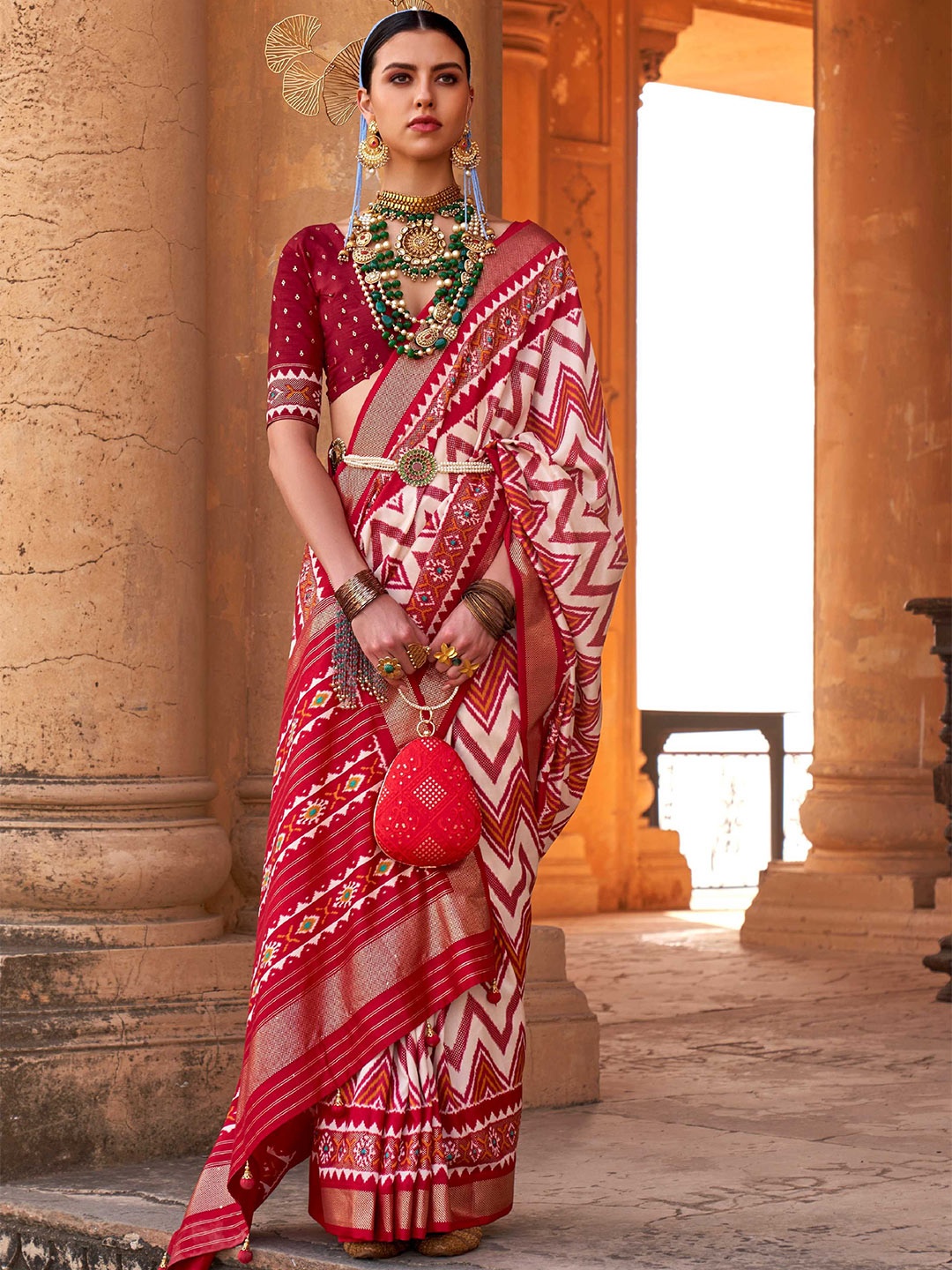 

Mitera Red & White Woven Design Zari Silk Blend Patola Saree