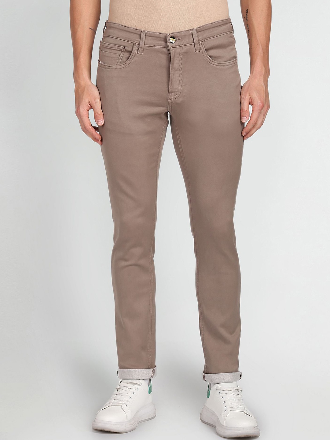 

Arrow Sport Men Slim Fit Mid-Rise Clean Look Jeans, Taupe