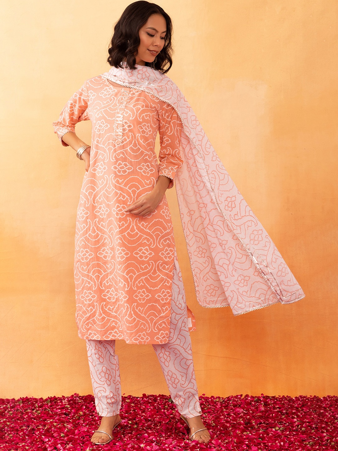 

Rang by Indya Bandhani Printed Gotta Patti Mirror Work Pure Cotton Kurta With Trouser & Dupatta, Peach