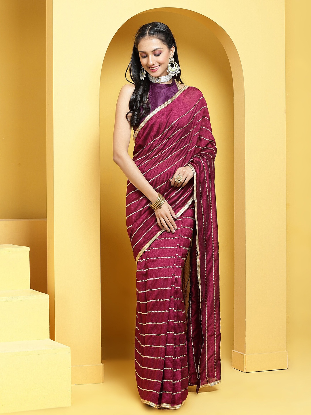 

Anouk Burgundy & Gold-Toned Striped Embroidered Saree