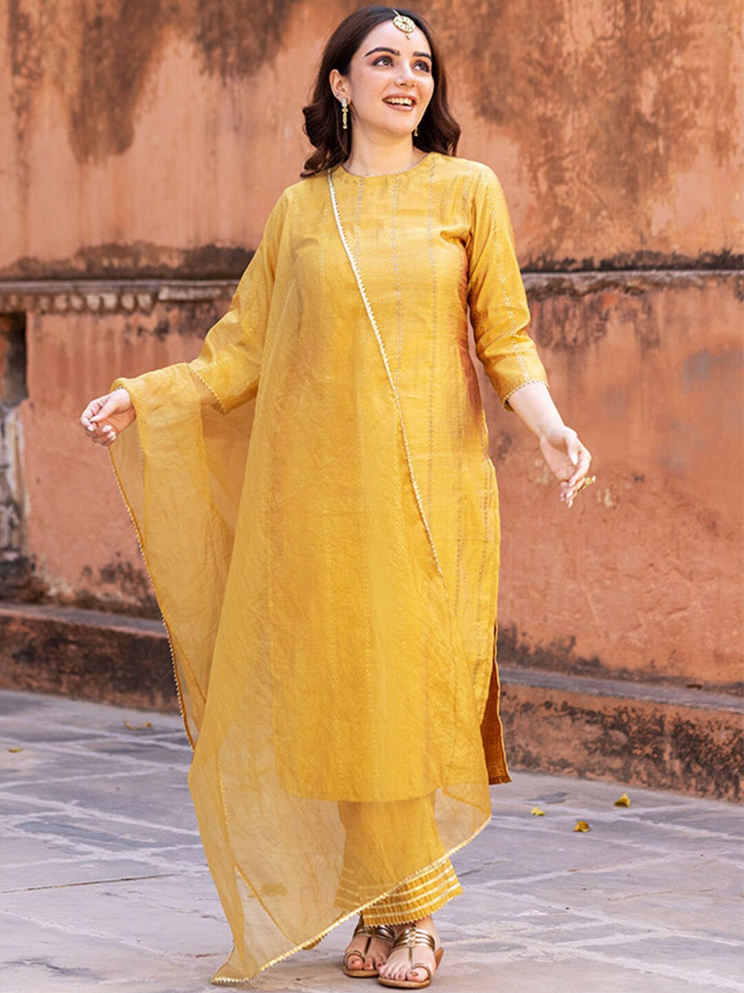 

Ambraee Ethnic Self Design Gotta Patti Chanderi Cotton Kurta with Trousers & Dupatta, Mustard