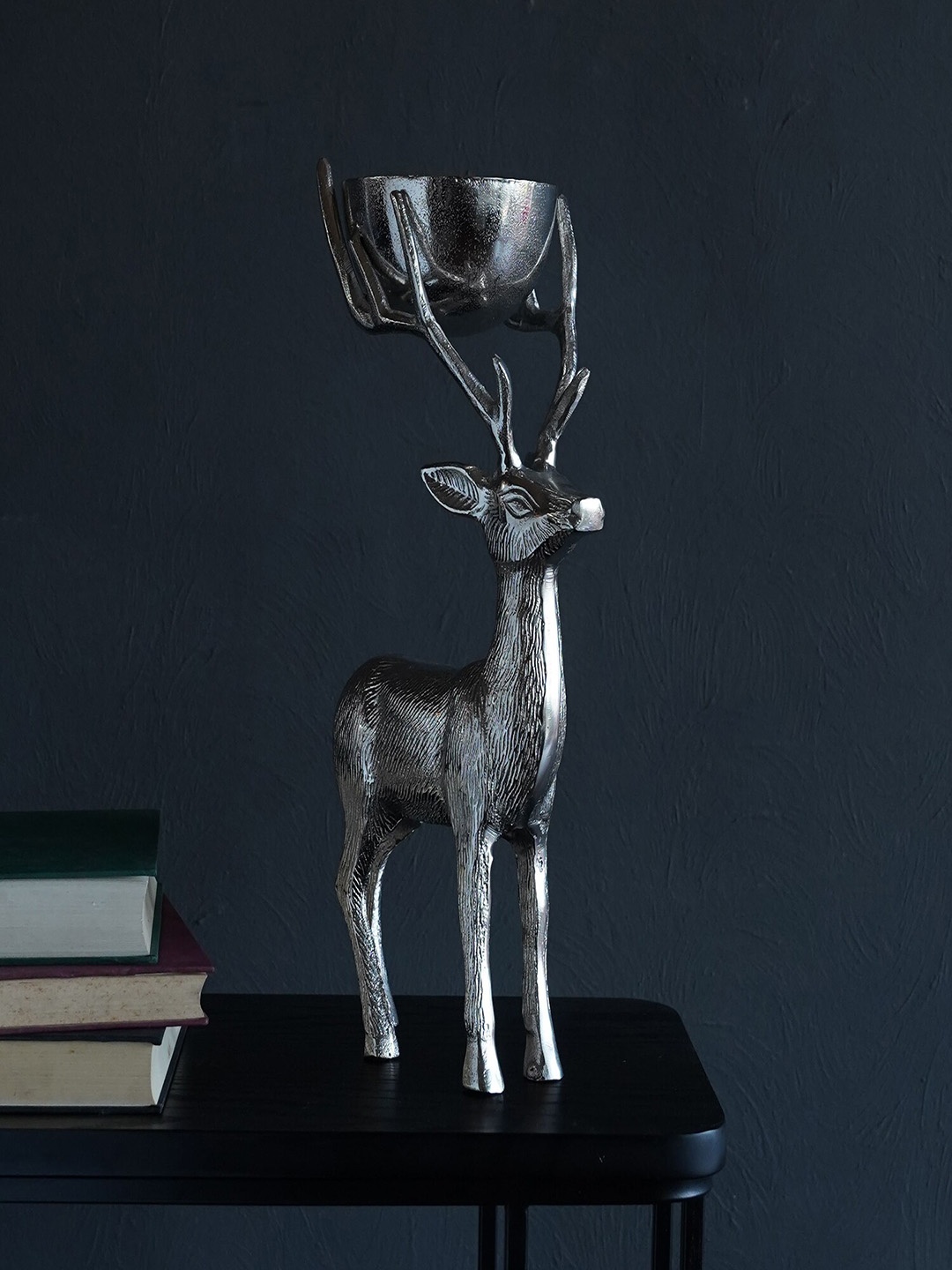 

Folkstorys Silver Toned Textured Deer Figurine Showpiece
