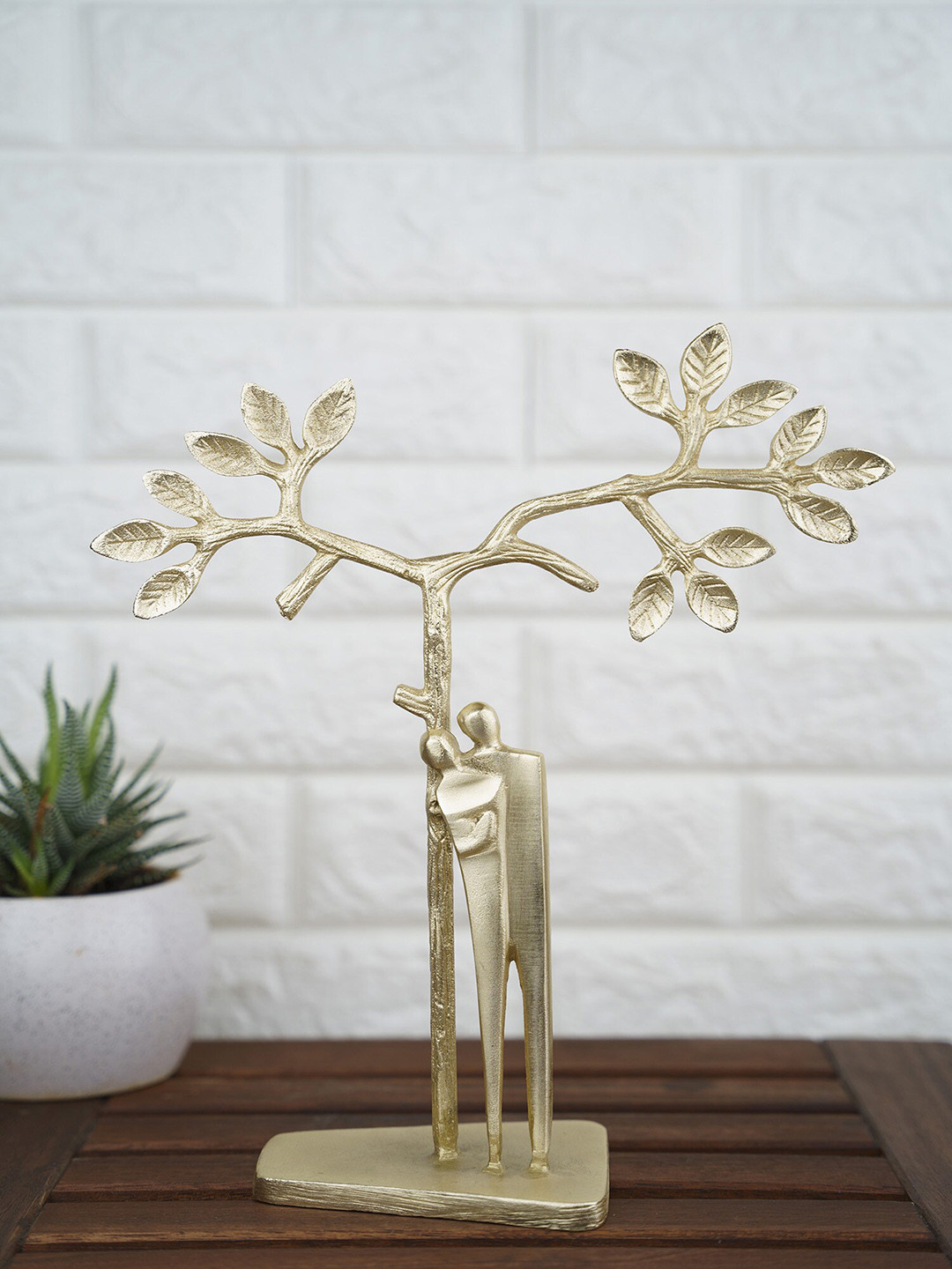 

Folkstorys Gold-Toned Textured Tree Figurine Showpiece