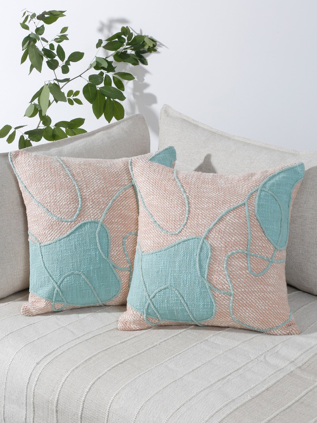 

eyda Peach-Coloured & White 2 Pieces Cotton Quirky Square Cushion Covers