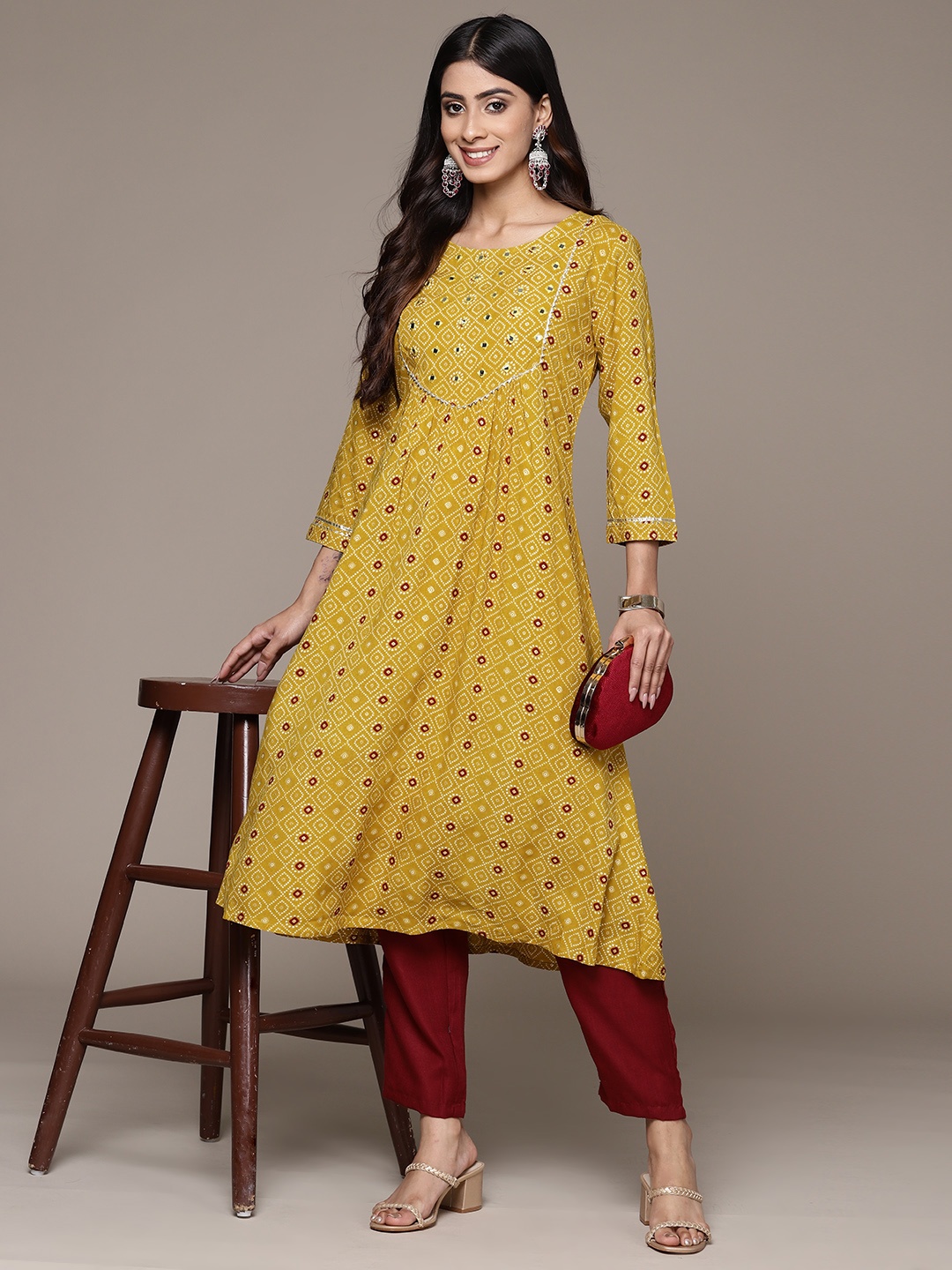 

Ishin Bandhani Printed Mirror Work Kurta, Mustard