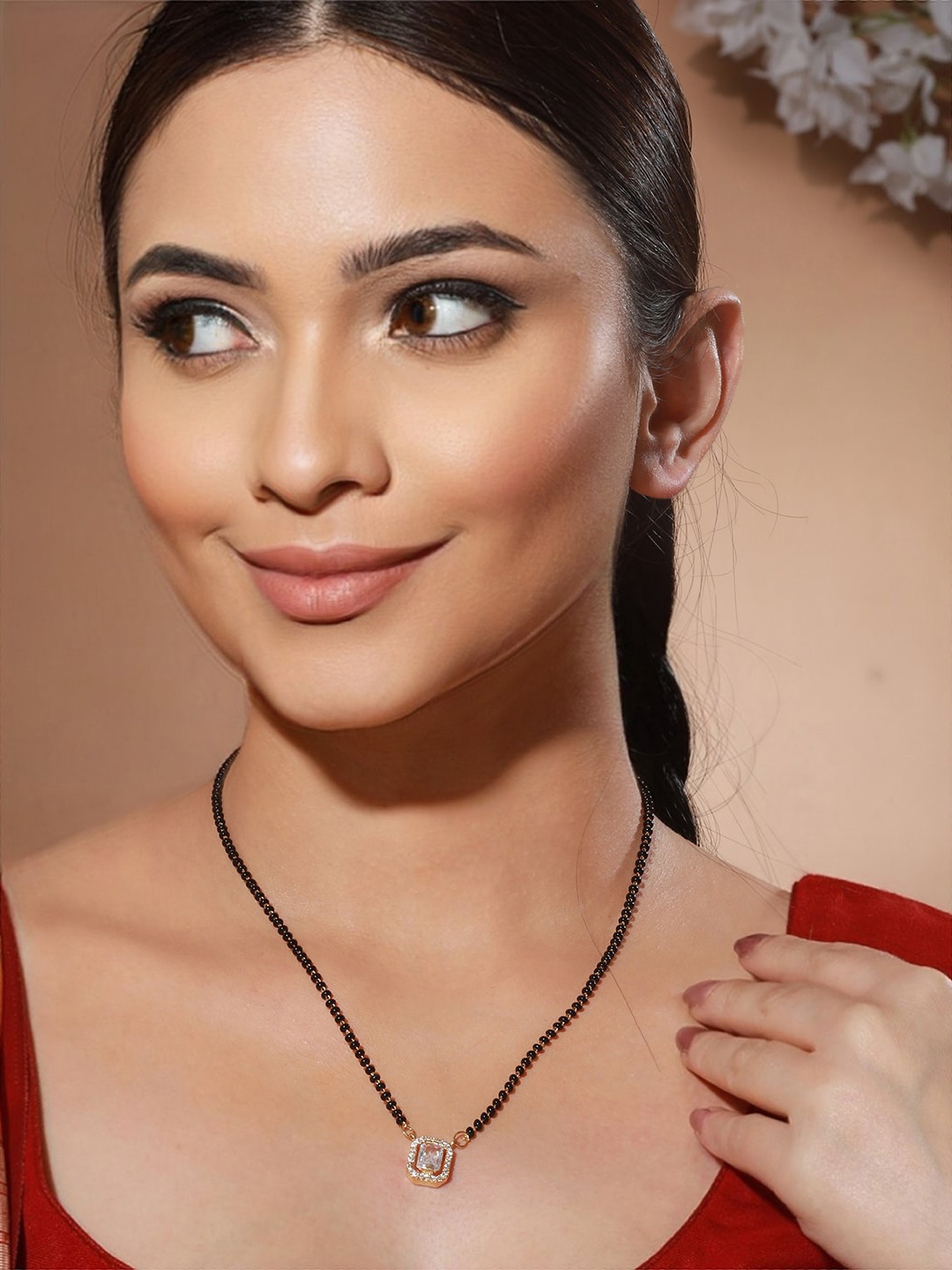 

Priyaasi Gold-Plated White AD Stone-Studded Beaded Mangalsutra