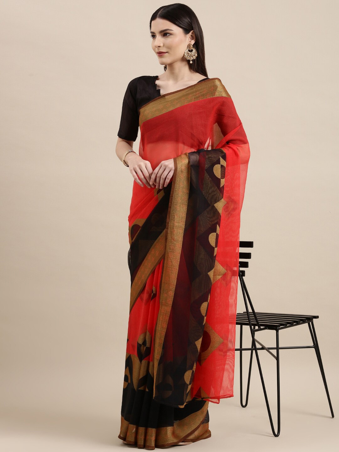 

Shaily Coral & Black Geometric Printed Zari Brasso Saree