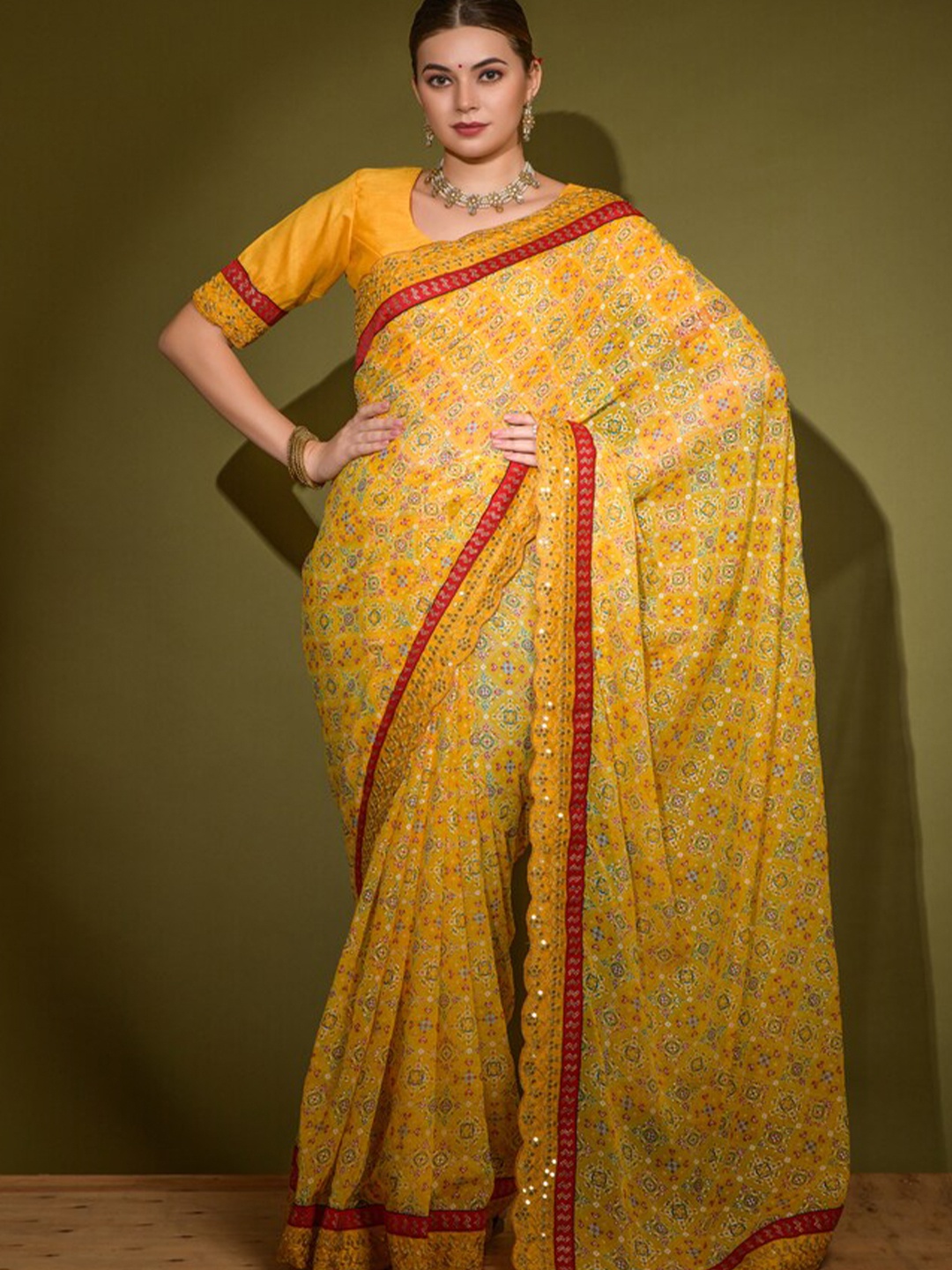 

DIVASTRI Ethnic Motifs Printed Embellished Saree, Yellow