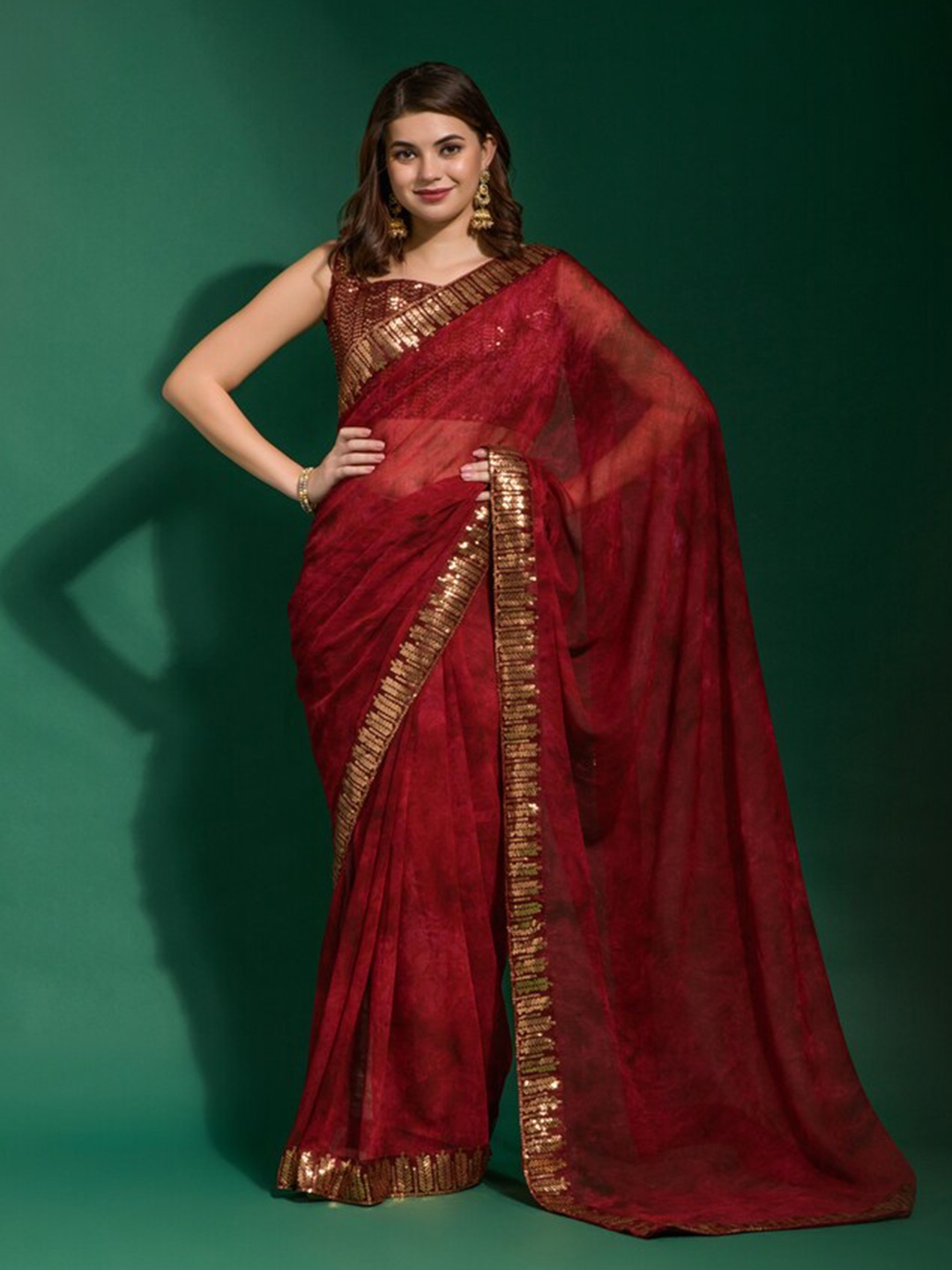 

DIVASTRI Abstract Printed Embellished Saree, Maroon
