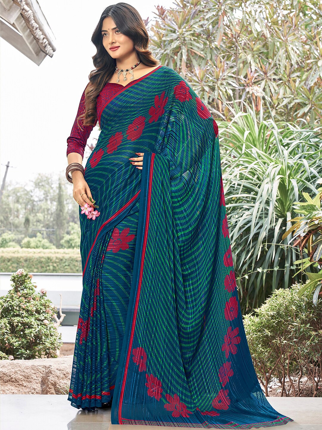 

Satrani Teal Green & Red Striped Poly Georgette Saree