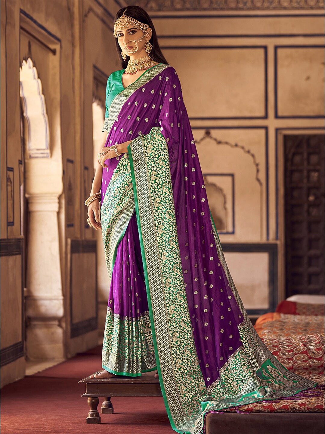 

Mitera Purple & Green Ethnic Motif Woven Design Zari Banarasi Saree