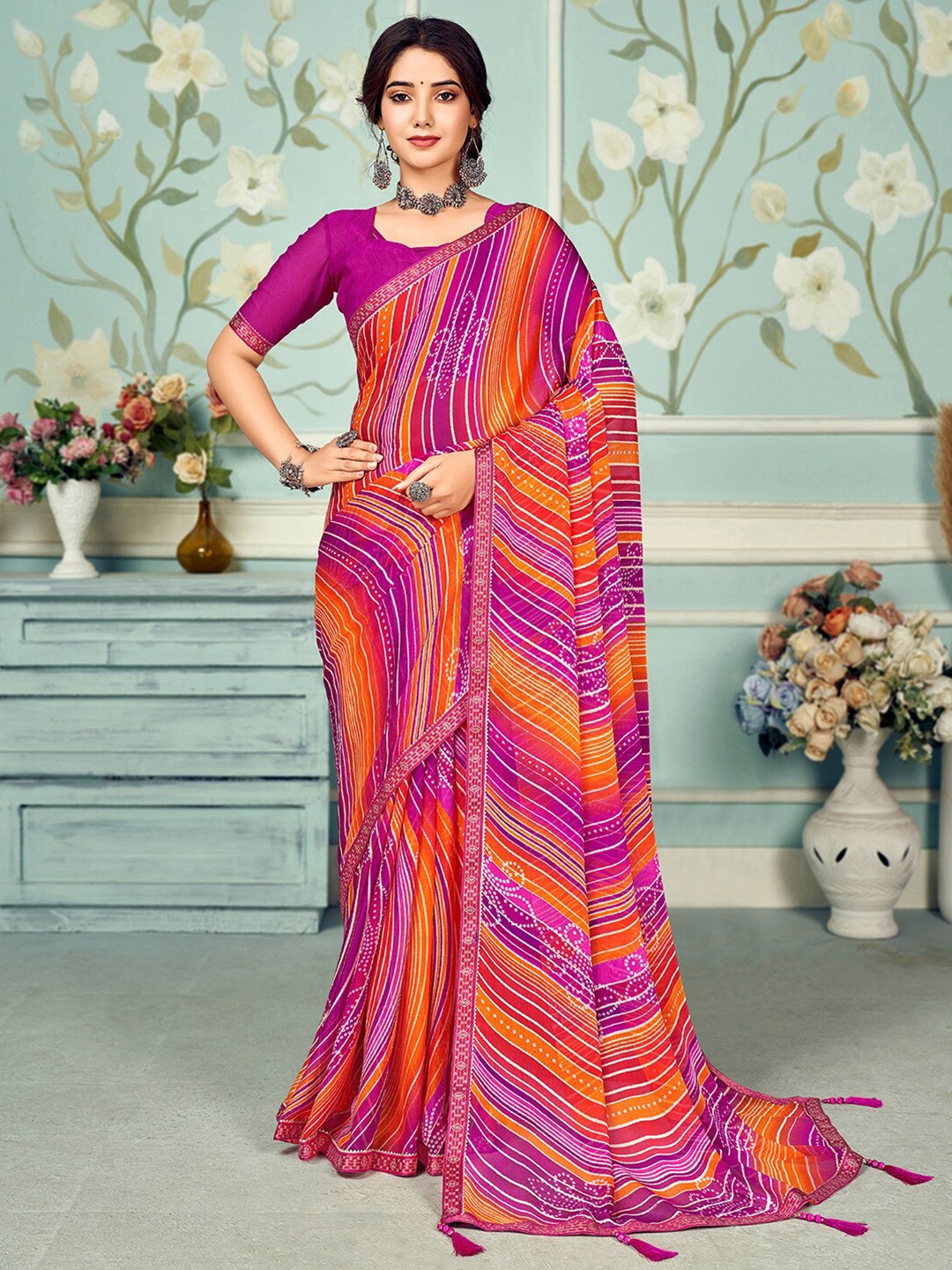 

Mitera Orange & Yellow Striped Embellished Saree