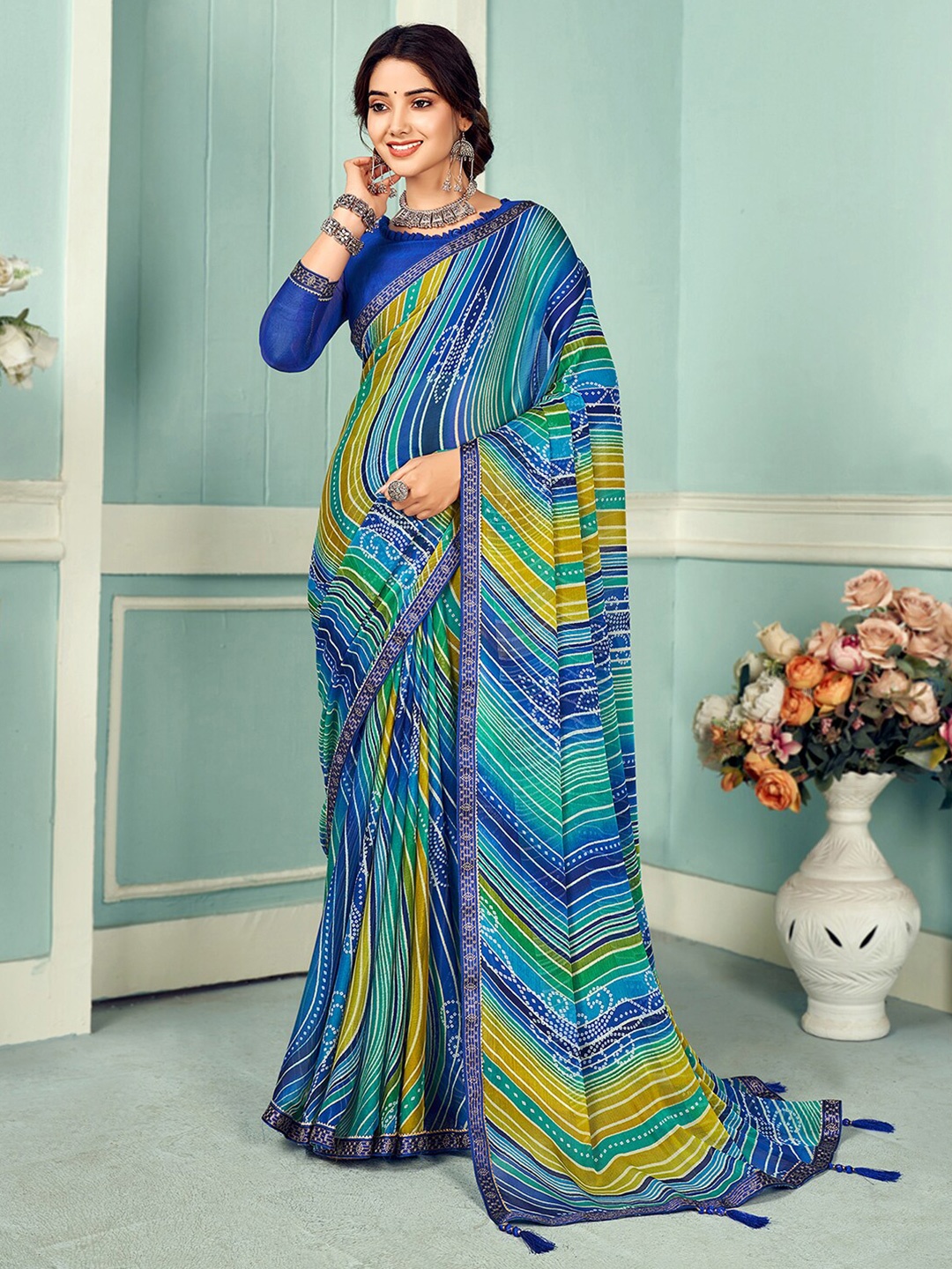 

Mitera Blue & Yellow Striped Embellished Saree