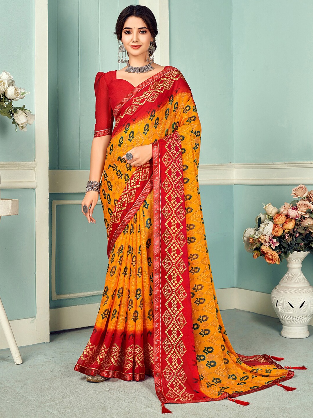 

Mitera Yellow & Red Bandhini Printed Embellished Saree