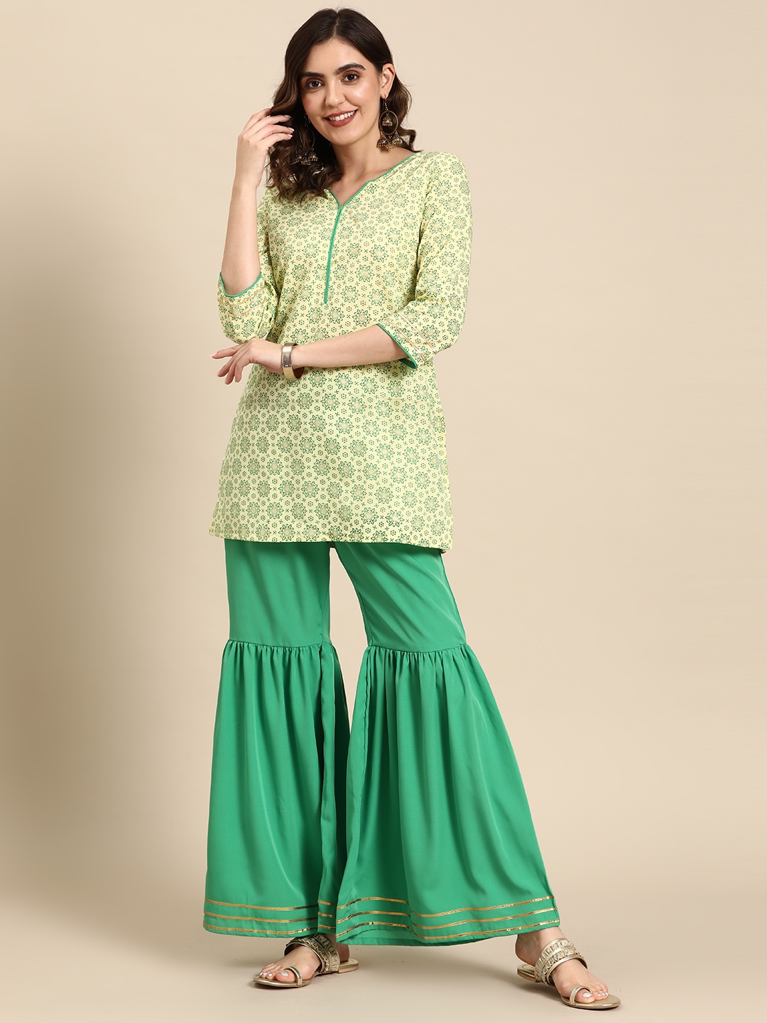 

Sangria Women Ethnic Motifs Printed Gotta Patti Kurti with Sharara, Green