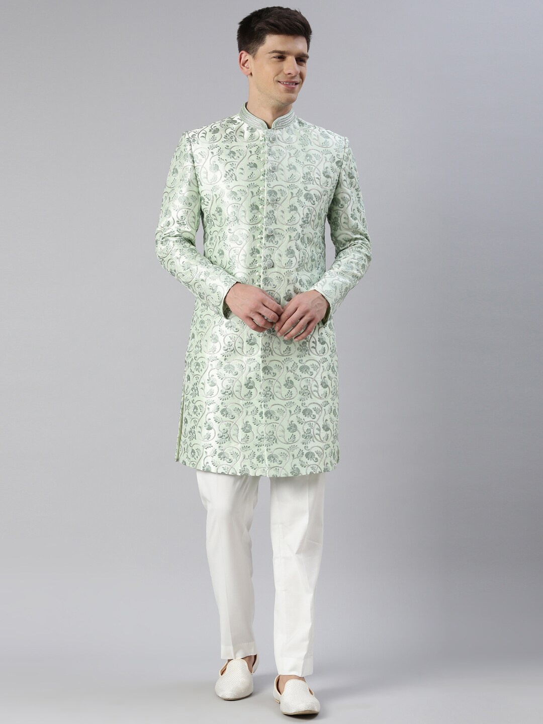 

TheEthnic.Co Ethnic Motif Thread Work Embroidered Knee-Length Sherwani With Trousers, Green