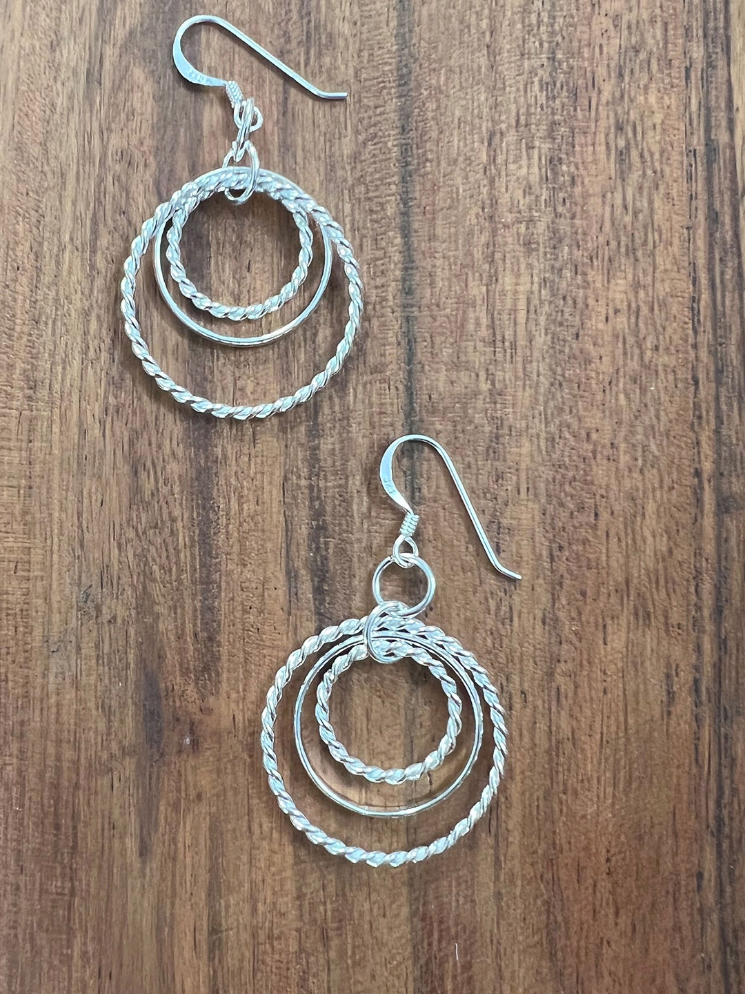 

Arte Jewels Silver-Plated Circular Drop Earrings