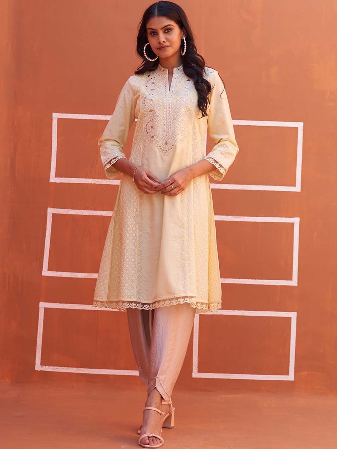 

Lakshita Manadrin Collar Paneled Floral Embroidered Mirror Work A-Line Kurta, Yellow