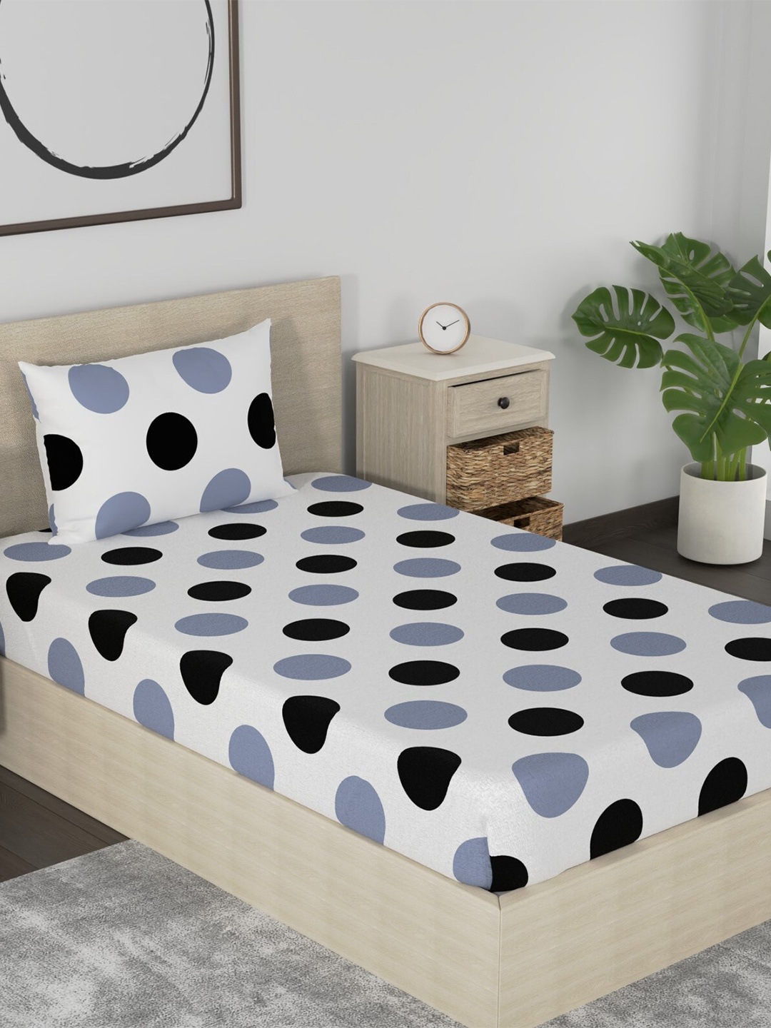 

Huesland Aspire Black & White Printed 186 TC Cotton Single Bedsheet & Pillow Cover