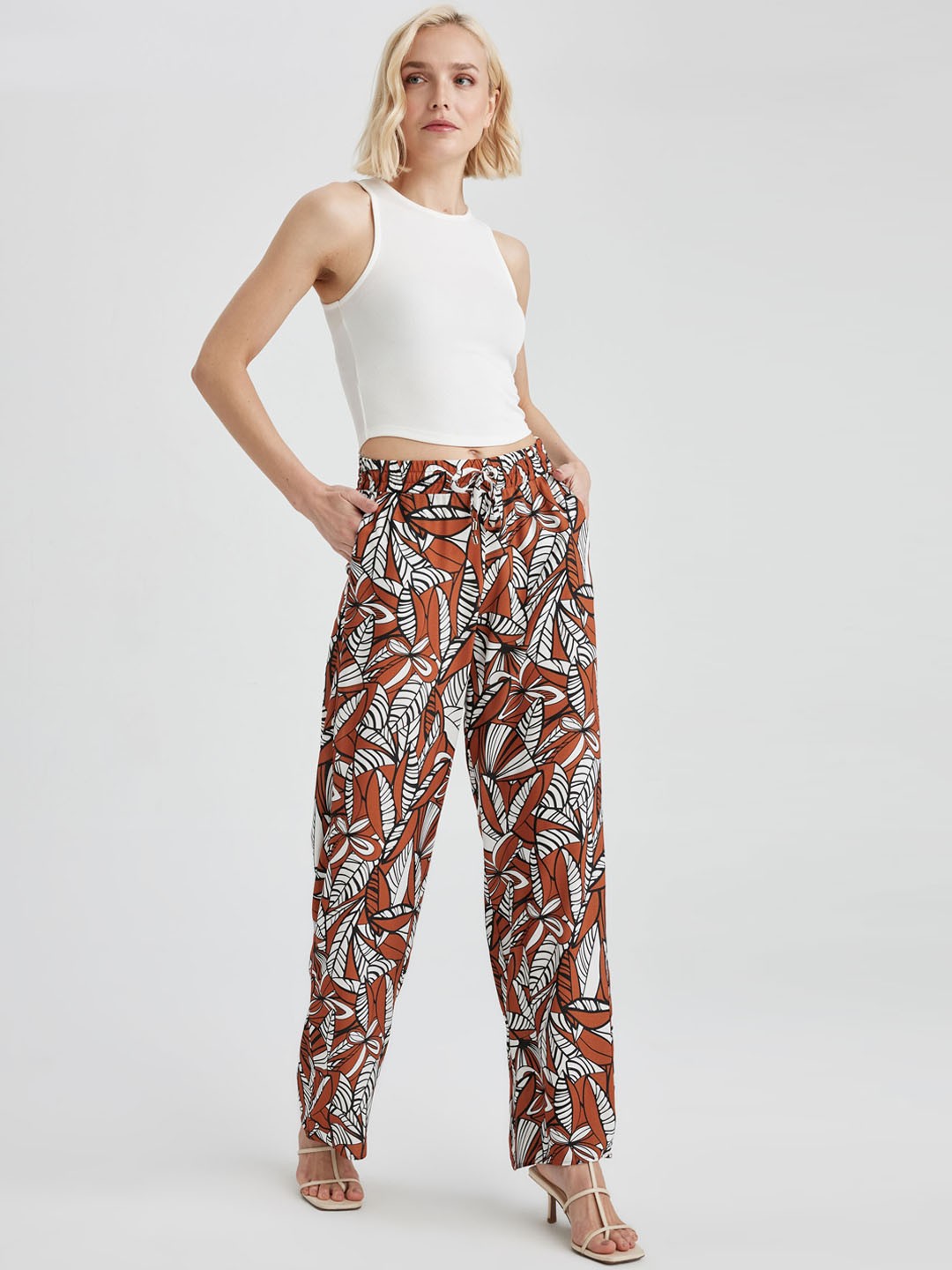 

DeFacto Women Mid-Rise Floral Printed Parallel Trousers, Brown